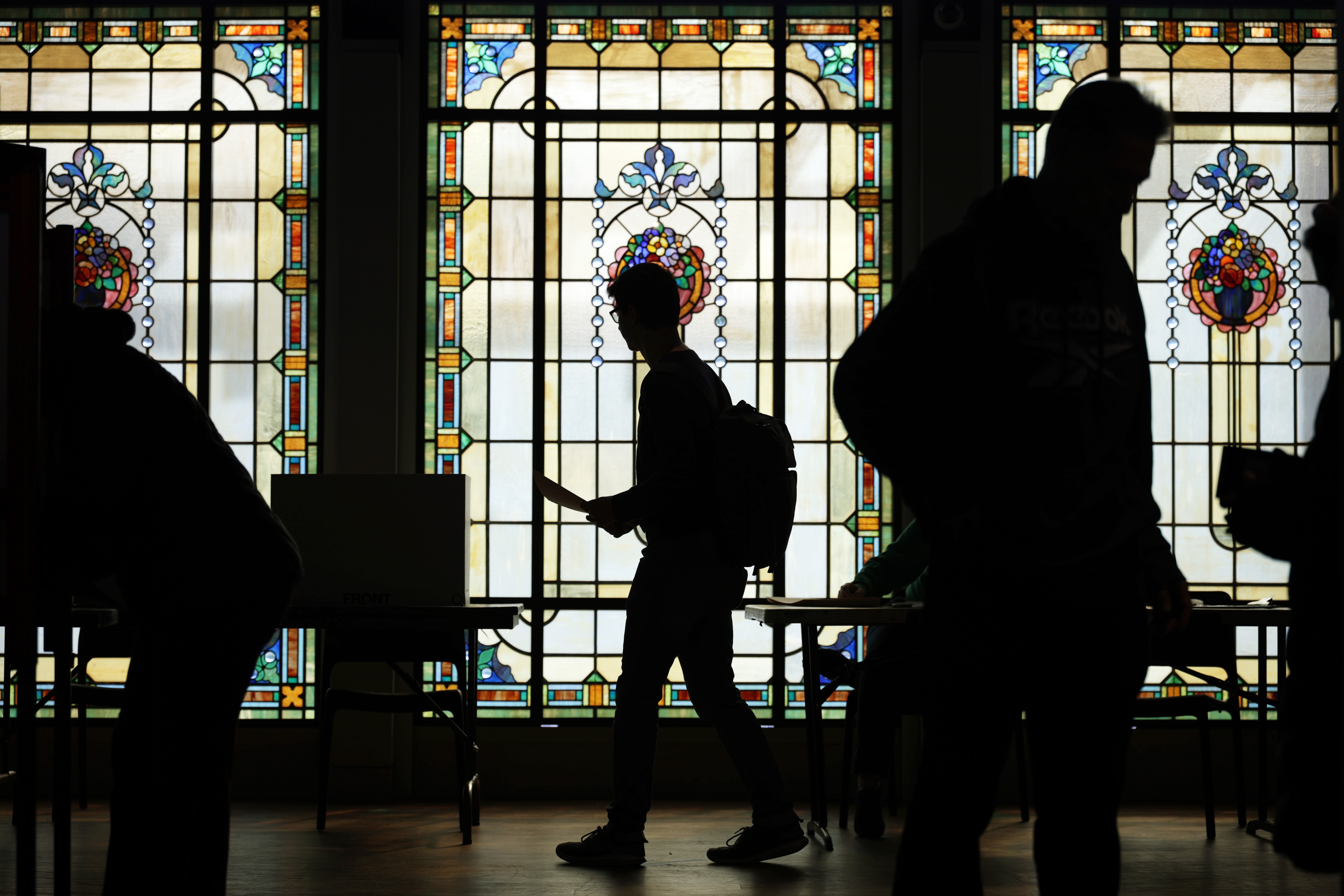 Voters cast their ballots at a polling station on Nov. 4, 2025 in Arlington, Virginia.